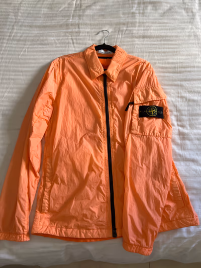 Stone Island Orange Overshirt by Stone Island — pre-loved on Thrifted.mt