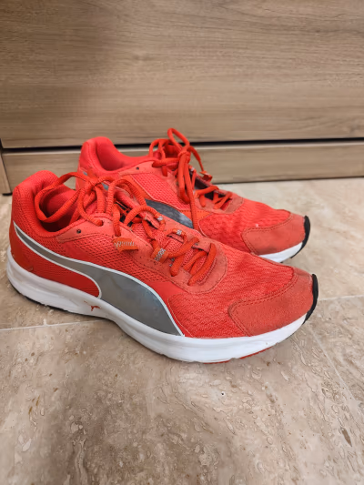 Salmon Puma running trainers by Puma — pre-loved on Thrifted.mt