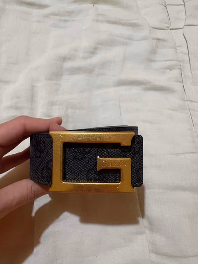 Guess Black Monogram Belt Gold Buckle by Guess — pre-loved on Thrifted.mt