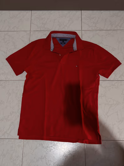 Red Tommy Hilfiger Polo Shirt by Tommy Hilfiger — pre-loved on Thrifted.mt