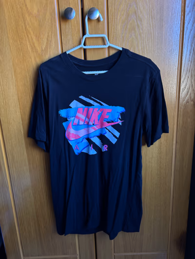 Nike Air Graphic T-Shirt by Nike — pre-loved on Thrifted.mt