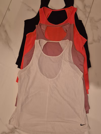 Nike Tank Tops bundle by Nike — pre-loved on Thrifted.mt