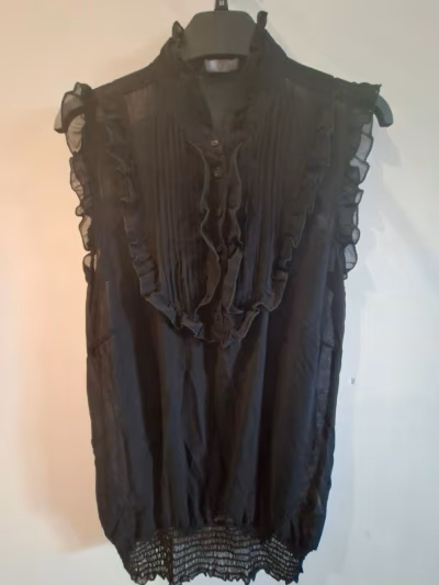 Black Ruffled Sleeveless Blouse — pre-loved on Thrifted.mt