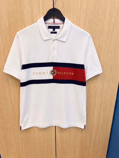Tommy Hilfiger Graphic Polo Shirt by Tommy Hilfiger — pre-loved on Thrifted.mt