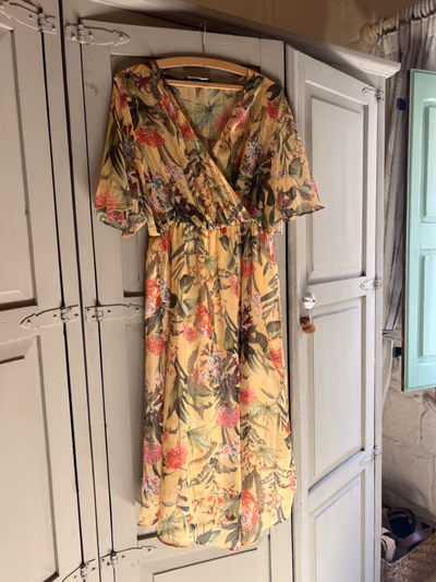 Floral yellow wrap midi dress by Zara — pre-loved on Thrifted.mt