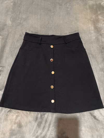 Black Button Mini Skirt — pre-loved on Thrifted.mt
