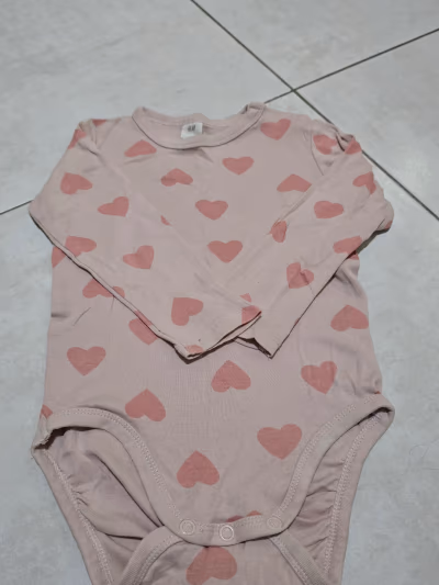 H&M Pink Heart Print Baby Bodysuit by H&M — pre-loved on Thrifted.mt