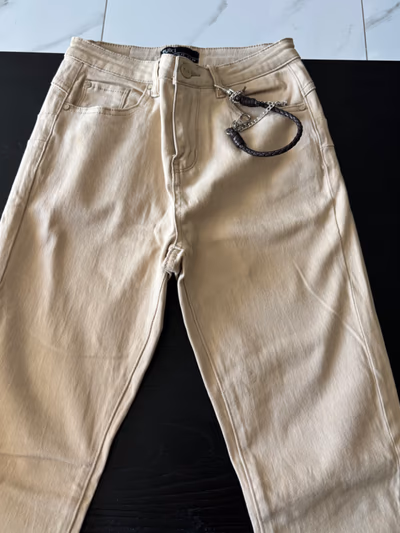 Beige denim trousers — pre-loved on Thrifted.mt