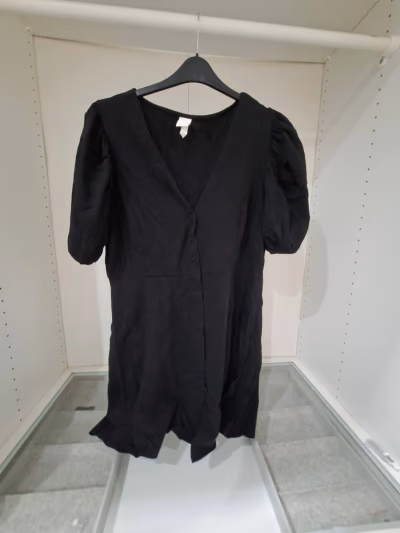 Black puff sleeve button dress by H&M — pre-loved on Thrifted.mt