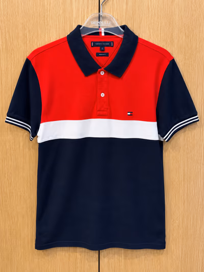 Tommy Hilfiger Polo by Tommy Hilfiger — pre-loved on Thrifted.mt