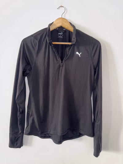 Puma Black Quarter Zip Top by Puma — pre-loved on Thrifted.mt