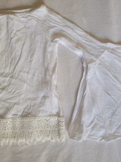 White flowy top with bell sleeves  — pre-loved on Thrifted.mt