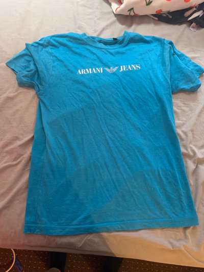 Maglietta Emporio Armani Bright Blue by Emporio Armani — pre-loved on Thrifted.mt