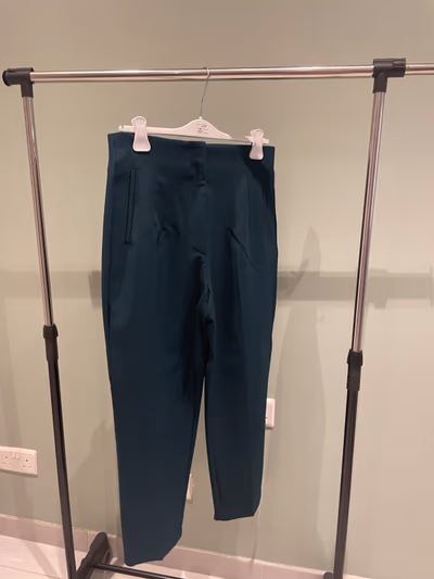 Dark green tailored high-waisted trousers by Zara — pre-loved on Thrifted.mt