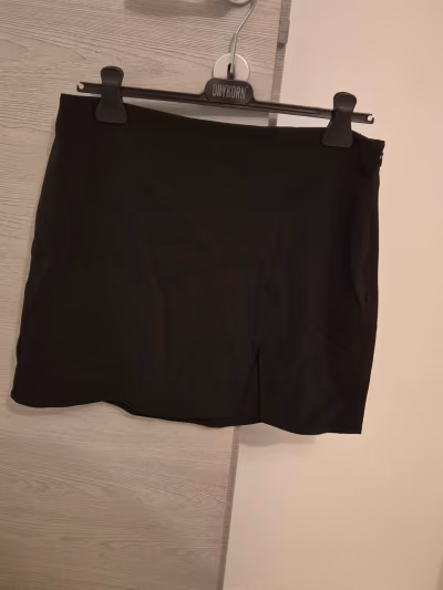 NA-KD Black Mini Skirt by NA-KD — pre-loved on Thrifted.mt