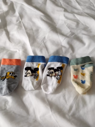 Disney Mickey Mouse baby socks — pre-loved on Thrifted.mt