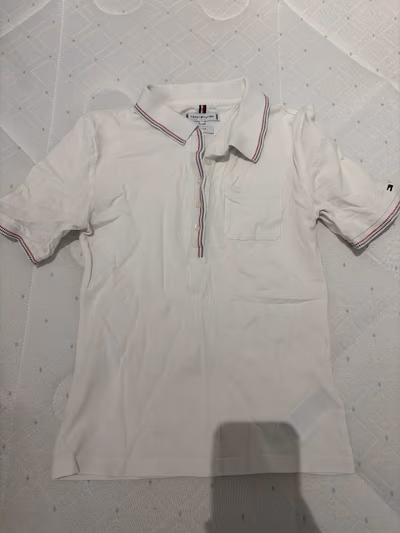 Tommy Hilfiger Slim Polo Shirt by Tommy Hilfiger — pre-loved on Thrifted.mt