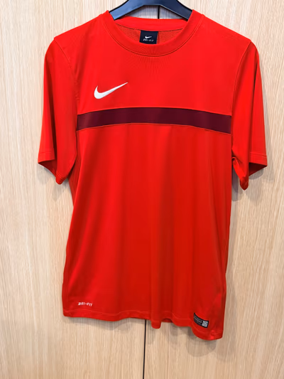 Red Nike Dri-Fit T-Shirt by Nike — pre-loved on Thrifted.mt