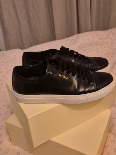 Axel Arigato Clean Black Sneakers by Axel Arigato — pre-loved on Thrifted.mt