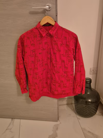Abstract face print button shirt by SHE PARIS — pre-loved on Thrifted.mt