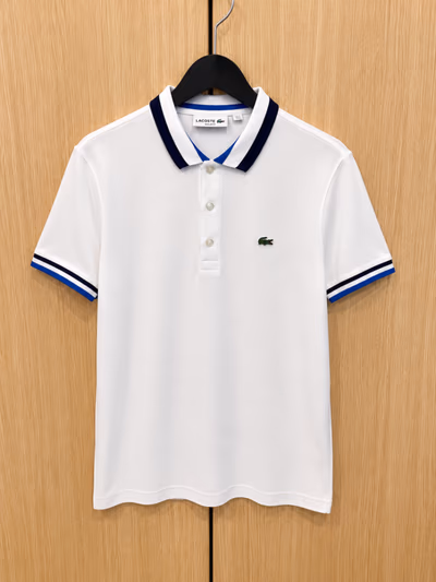 Lacoste White Tipped Polo Shirt by Lacoste — pre-loved on Thrifted.mt