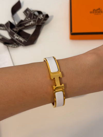 Hermès Clic H Gold Bracelet by Hermès — pre-loved on Thrifted.mt
