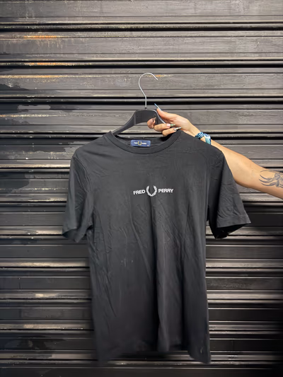 Fred Perry Black T-Shirt by Fred Perry — pre-loved on Thrifted.mt