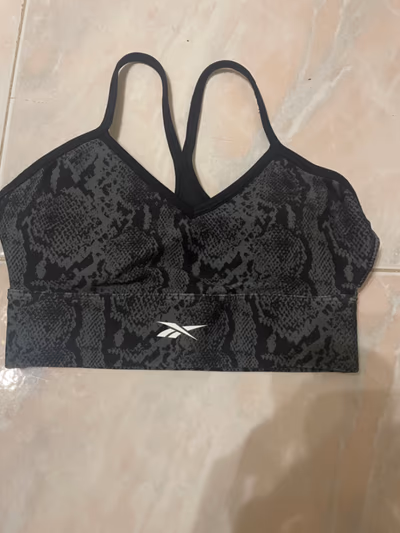 Patterned  Reebok Sports Bra by Reebok — pre-loved on Thrifted.mt