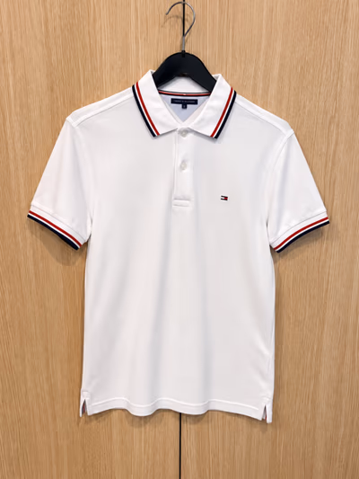 Tommy Hilfiger White Polo Shirt by Tommy Hilfiger — pre-loved on Thrifted.mt