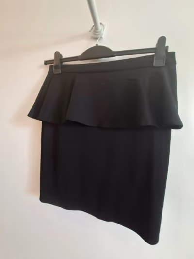 Black peplum mini skirt by Atmosphere — pre-loved on Thrifted.mt