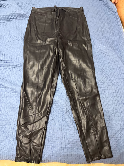Black faux leather trousers — pre-loved on Thrifted.mt