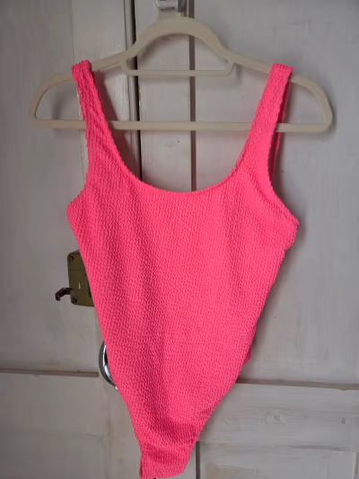 Neon pink textured swimsuit by Temu — pre-loved on Thrifted.mt
