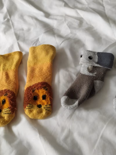 Animal themed baby socks — pre-loved on Thrifted.mt