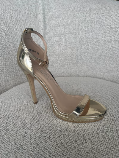 Gold metallic stiletto sandals by La Bottine Souriante — pre-loved on Thrifted.mt