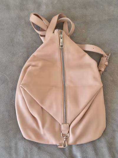 Carpisa Pink Faux Leather Backpack by Carpisa — pre-loved on Thrifted.mt