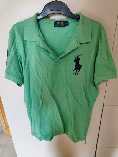 Green polo shirt — pre-loved on Thrifted.mt