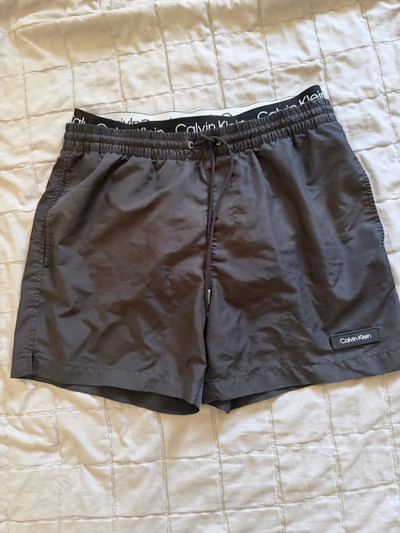 Calvin Klein Grey Swim Shorts by Calvin Klein — pre-loved on Thrifted.mt