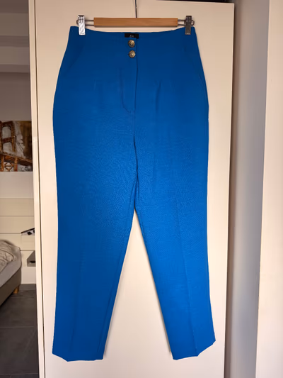 Bright blue high-waisted trousers by River Island — pre-loved on Thrifted.mt