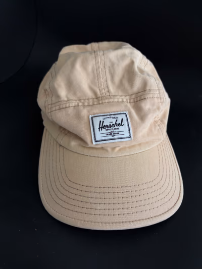 Herschel Supply Co Beige Cap by Herschel — pre-loved on Thrifted.mt