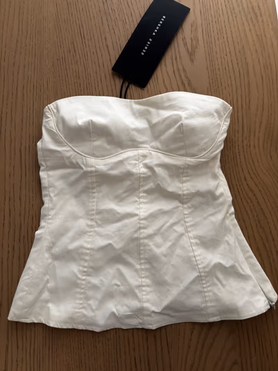 Bershka white strapless corset top by Bershka — pre-loved on Thrifted.mt