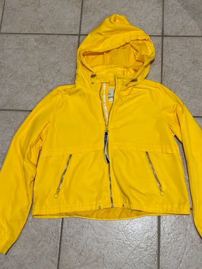 Bright yellow hooded lightweight jacket by Alcott — pre-loved on Thrifted.mt