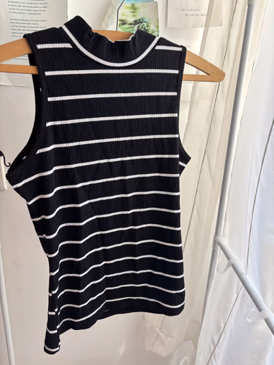 Black and white striped top by SHEIN — pre-loved on Thrifted.mt