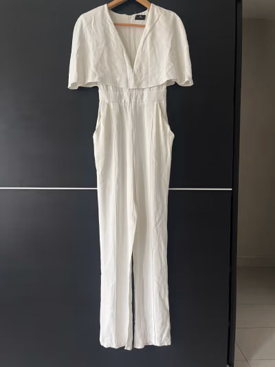 Elisabetta Franchi White Cape Jumpsuit by Elisabetta Franchi — pre-loved on Thrifted.mt
