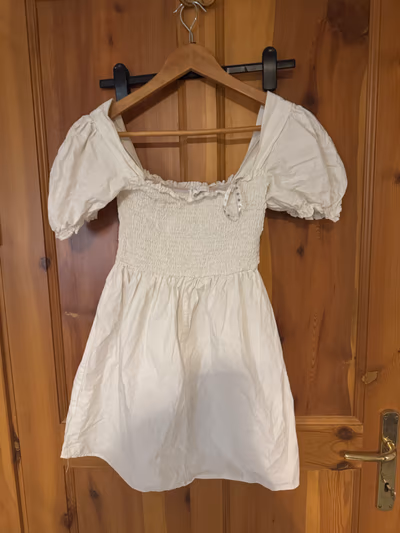 Cream puff-sleeve mini dress — pre-loved on Thrifted.mt