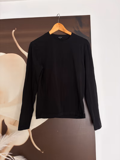 Calvin Klein Black Long-Sleeve Top by Calvin Klein — pre-loved on Thrifted.mt