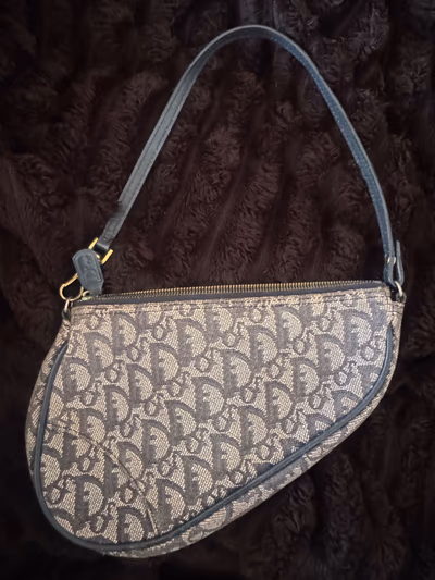 Christian Dior Trotter Saddle Bag by Christian Dior — pre-loved on Thrifted.mt