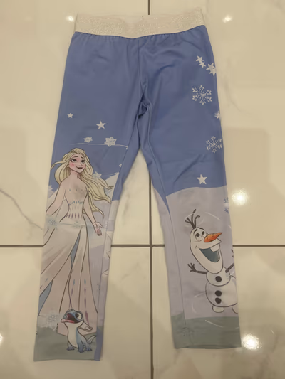 Leggings con estampado de personajes de Frozen — pre-loved on Thrifted.mt
