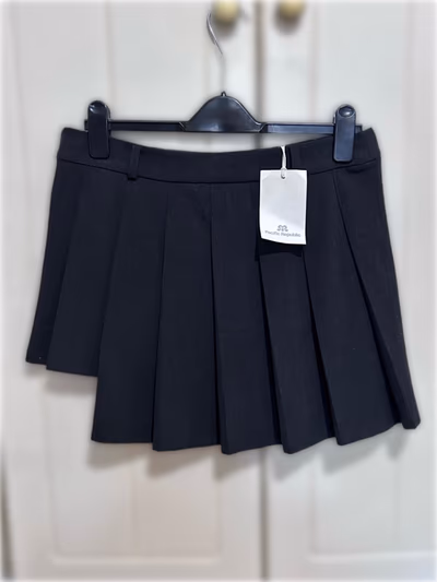 Pull and Bear Brand New Dark Grey Pleated Asymmetric Mini Skirt by Pull and Bear — pre-loved on Thrifted.mt