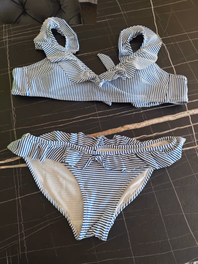 Striped Ruffled Bikini Set by Kiabi — pre-loved on Thrifted.mt