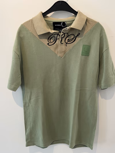 Polo Fred Perry de Raf Simons by Raf Simons x Fred Perry — pre-loved on Thrifted.mt